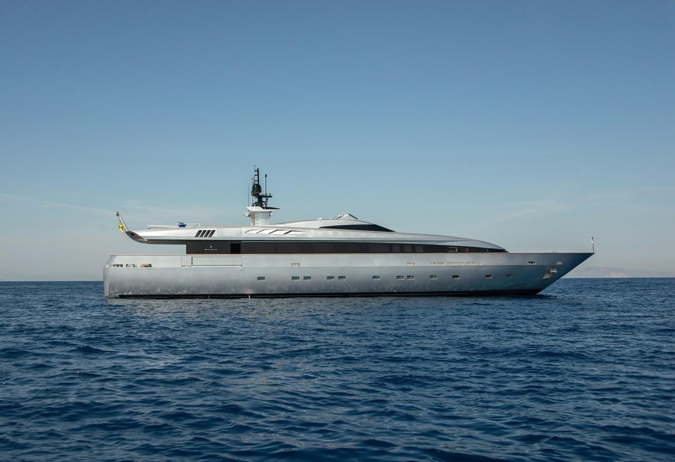 a large white ship in the water aboard TIN TIN Yacht for Sale
