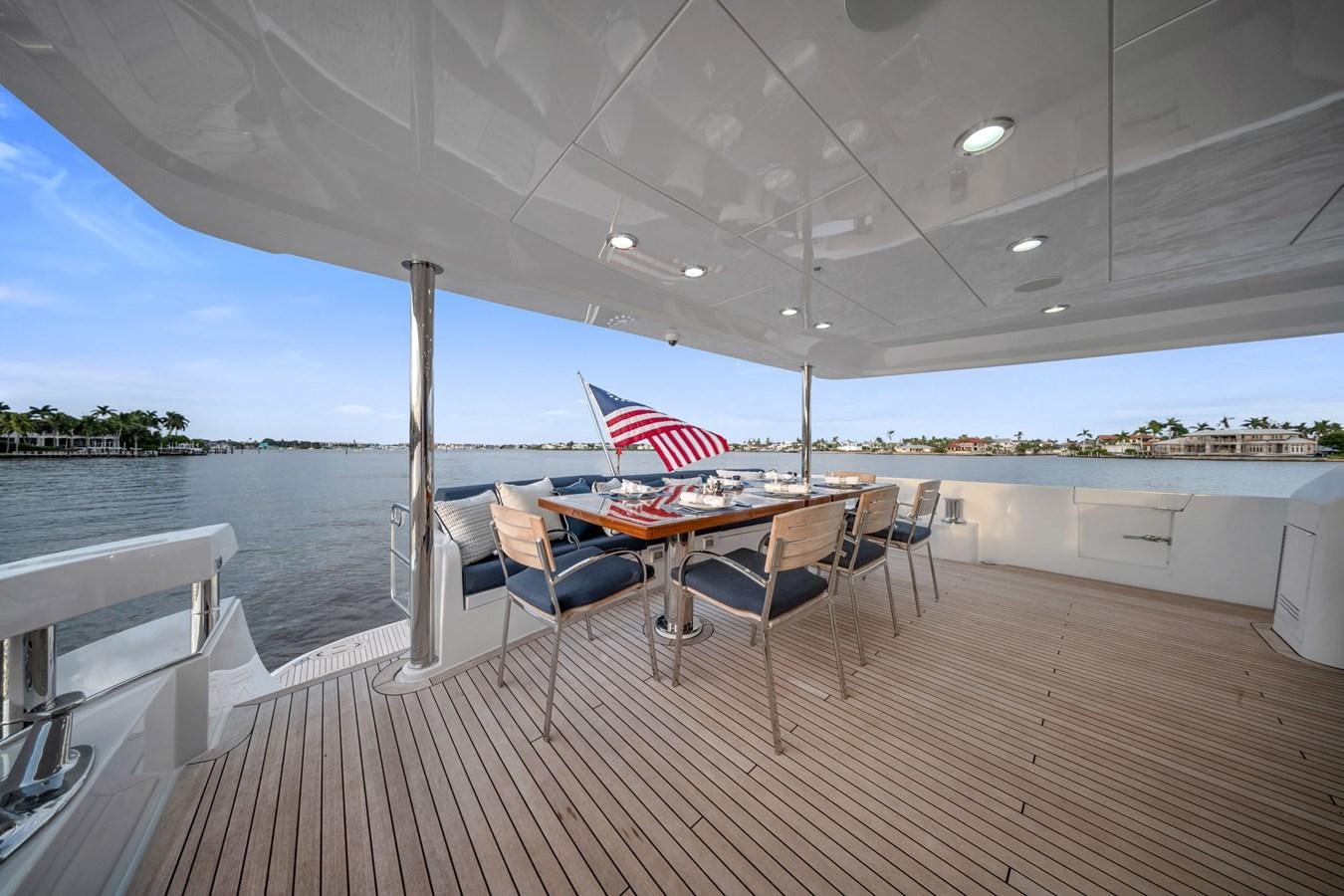 a table and chairs on a deck aboard ANOTHER IMPULSIVE DECISION Yacht for Sale