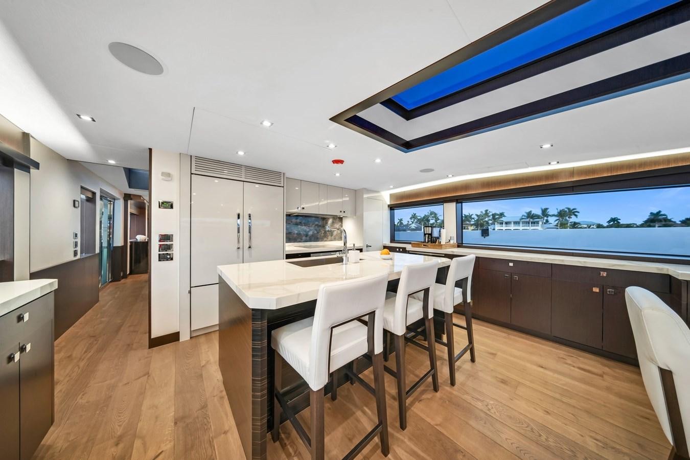 a kitchen and dining area aboard ANOTHER IMPULSIVE DECISION Yacht for Sale