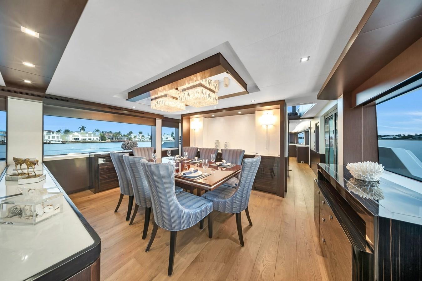 a dining room with a large open floor plan aboard ANOTHER IMPULSIVE DECISION Yacht for Sale