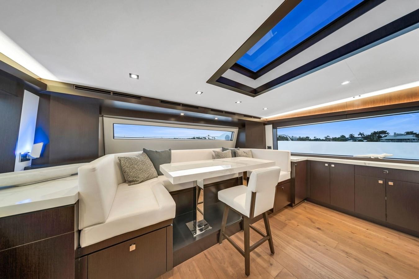 a room with a couch and a table aboard ANOTHER IMPULSIVE DECISION Yacht for Sale