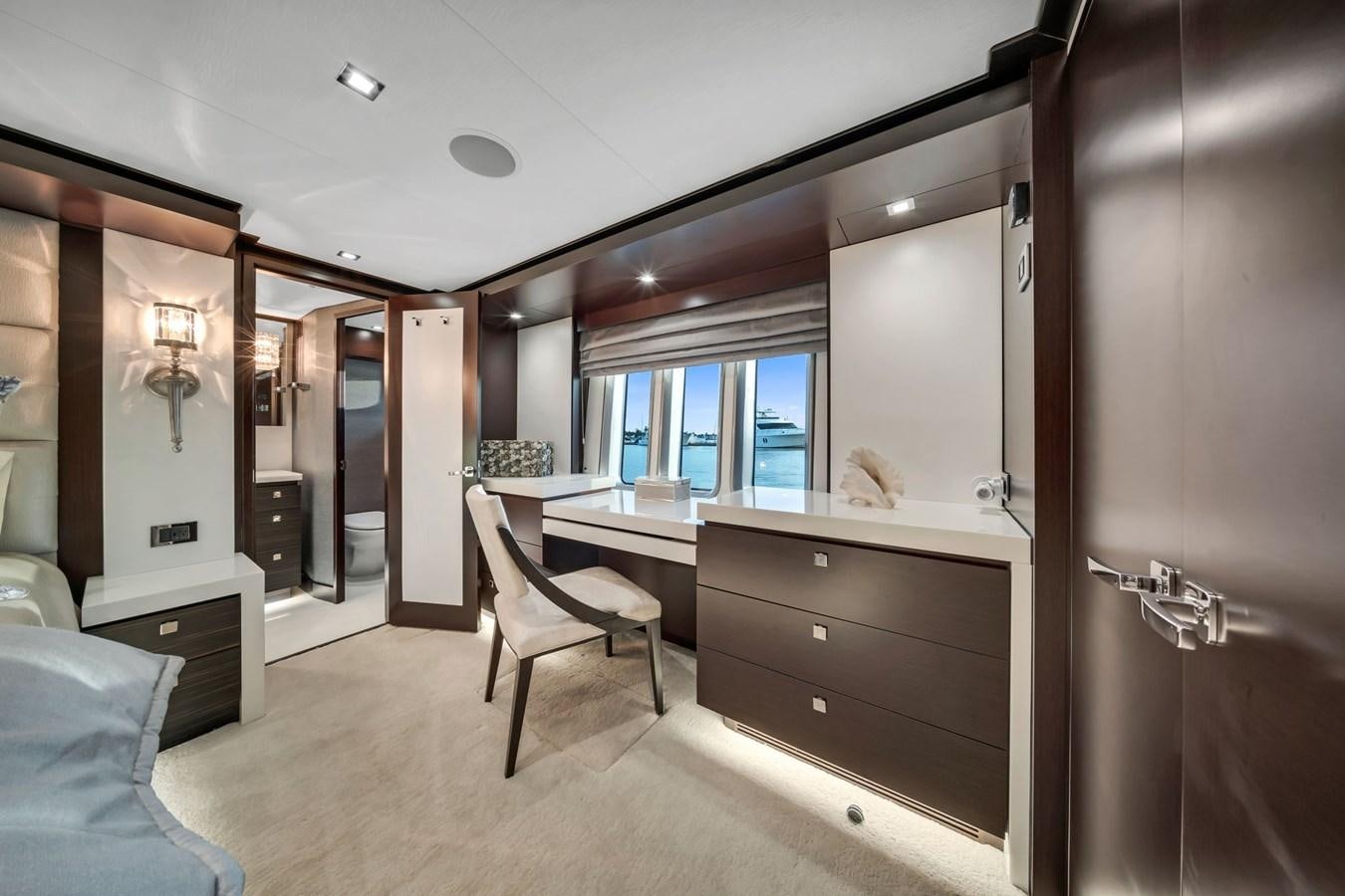 a room with a desk and chairs aboard ANOTHER IMPULSIVE DECISION Yacht for Sale