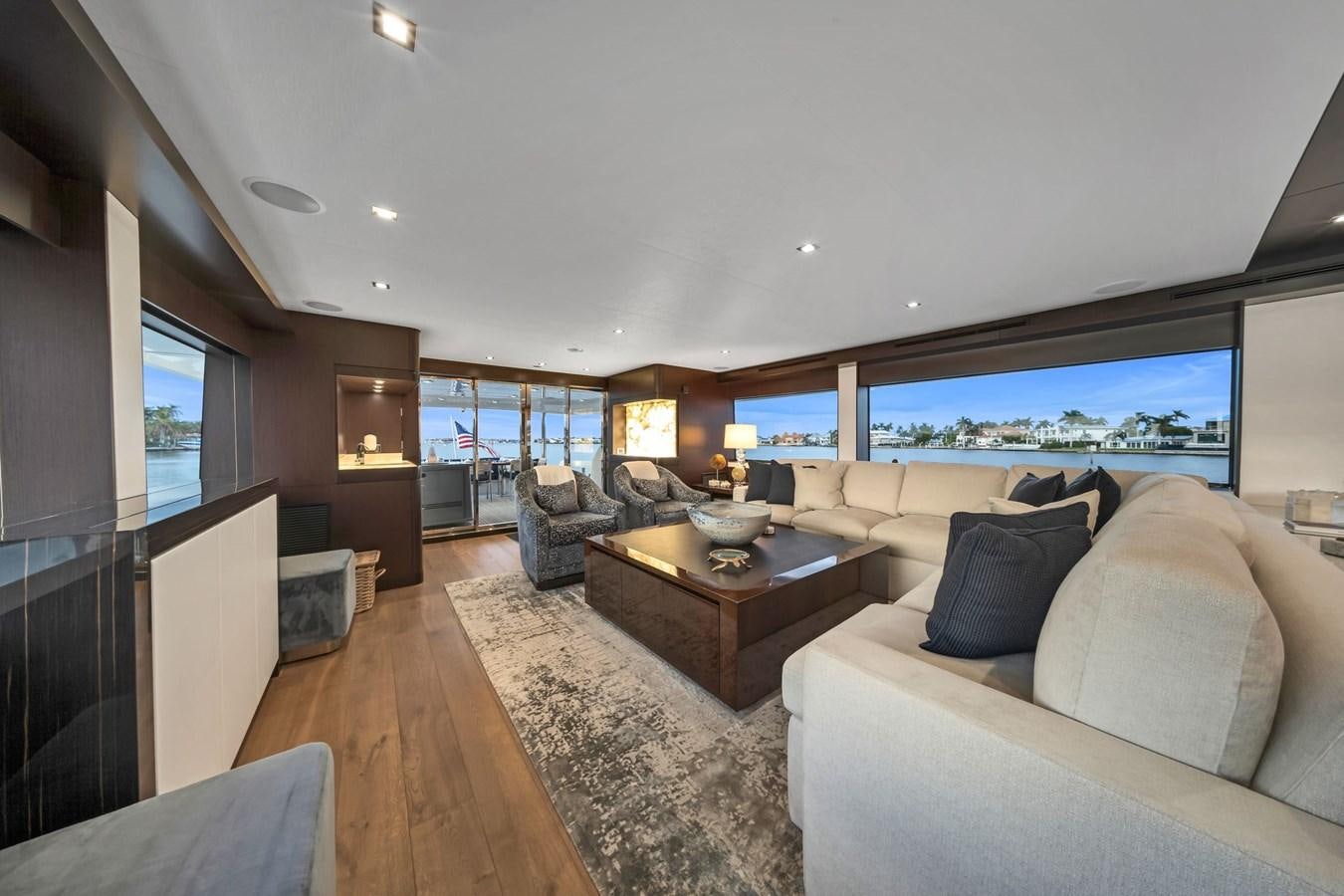 a living room with a large window aboard ANOTHER IMPULSIVE DECISION Yacht for Sale