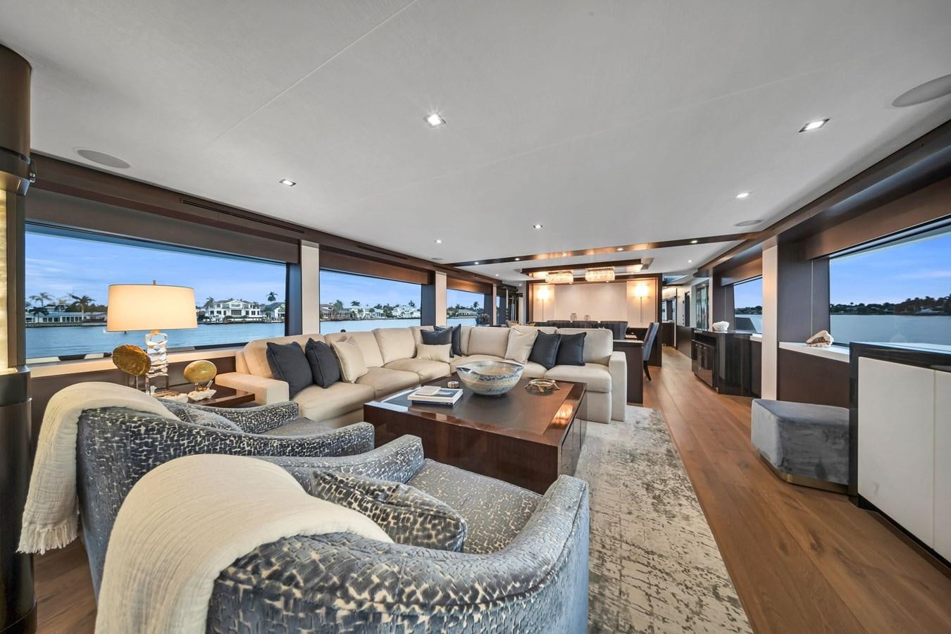 a living room with a large window aboard ANOTHER IMPULSIVE DECISION Yacht for Sale