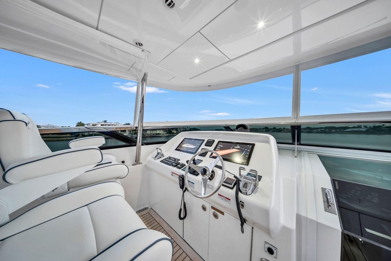 inside of a white car aboard ANOTHER IMPULSIVE DECISION Yacht for Sale