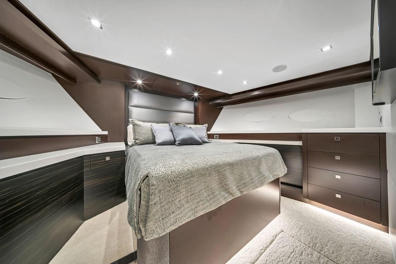 a room with a bed and a dresser aboard ANOTHER IMPULSIVE DECISION Yacht for Sale