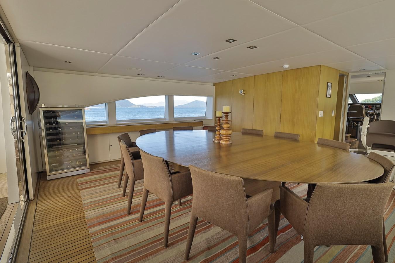 a large dining table in a room aboard PAPA-GOLFE Yacht for Sale