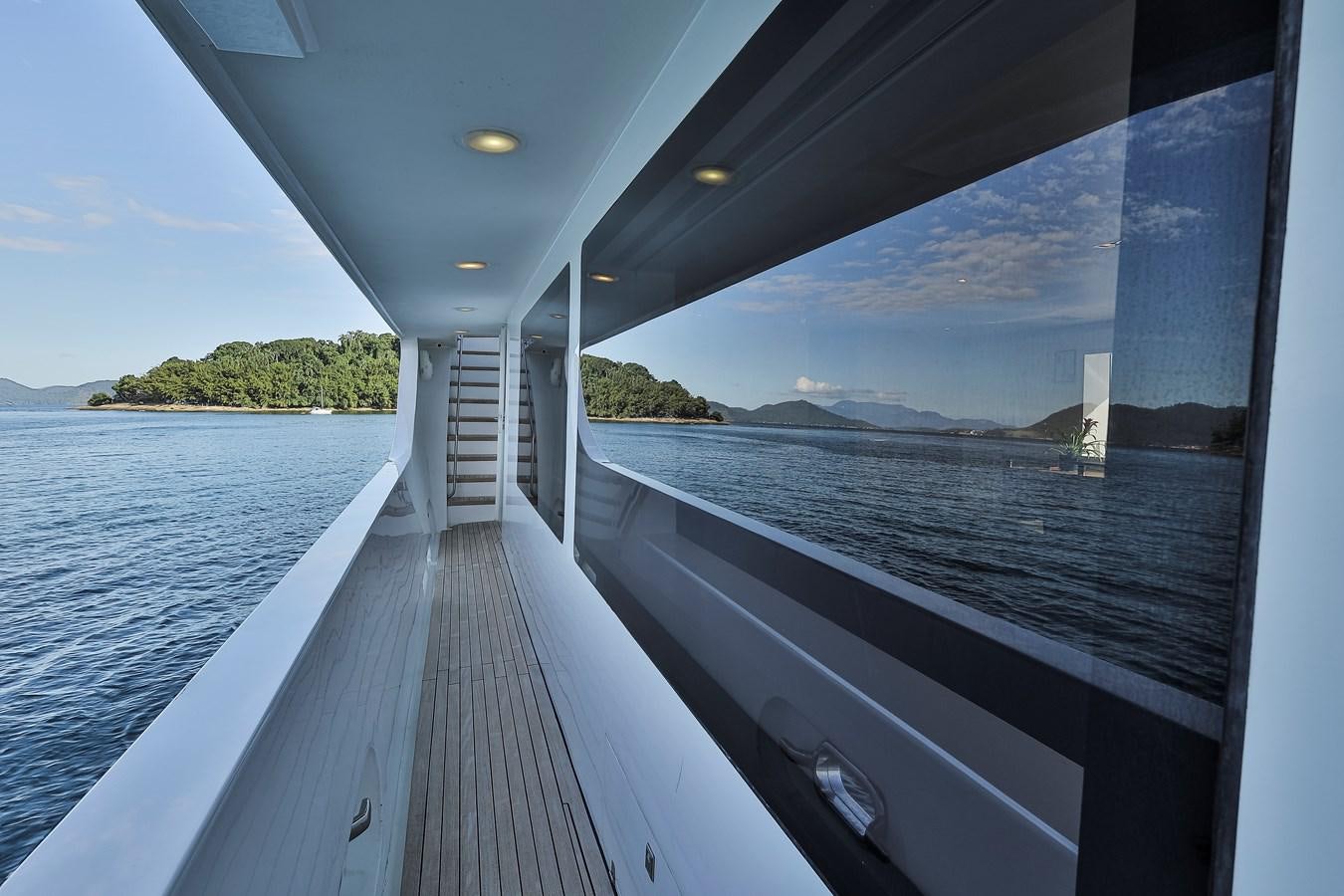 a long dock leading to a beach aboard PAPA-GOLFE Yacht for Sale