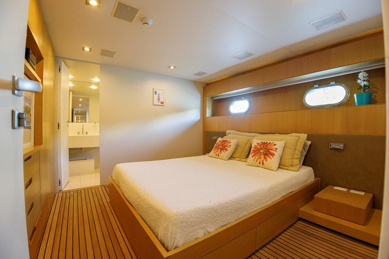 a bedroom with a bed aboard PAPA-GOLFE Yacht for Sale