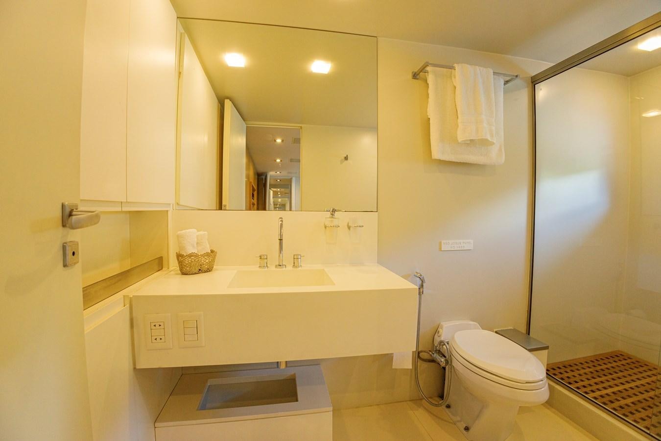 a bathroom with a sink and toilet aboard PAPA-GOLFE Yacht for Sale