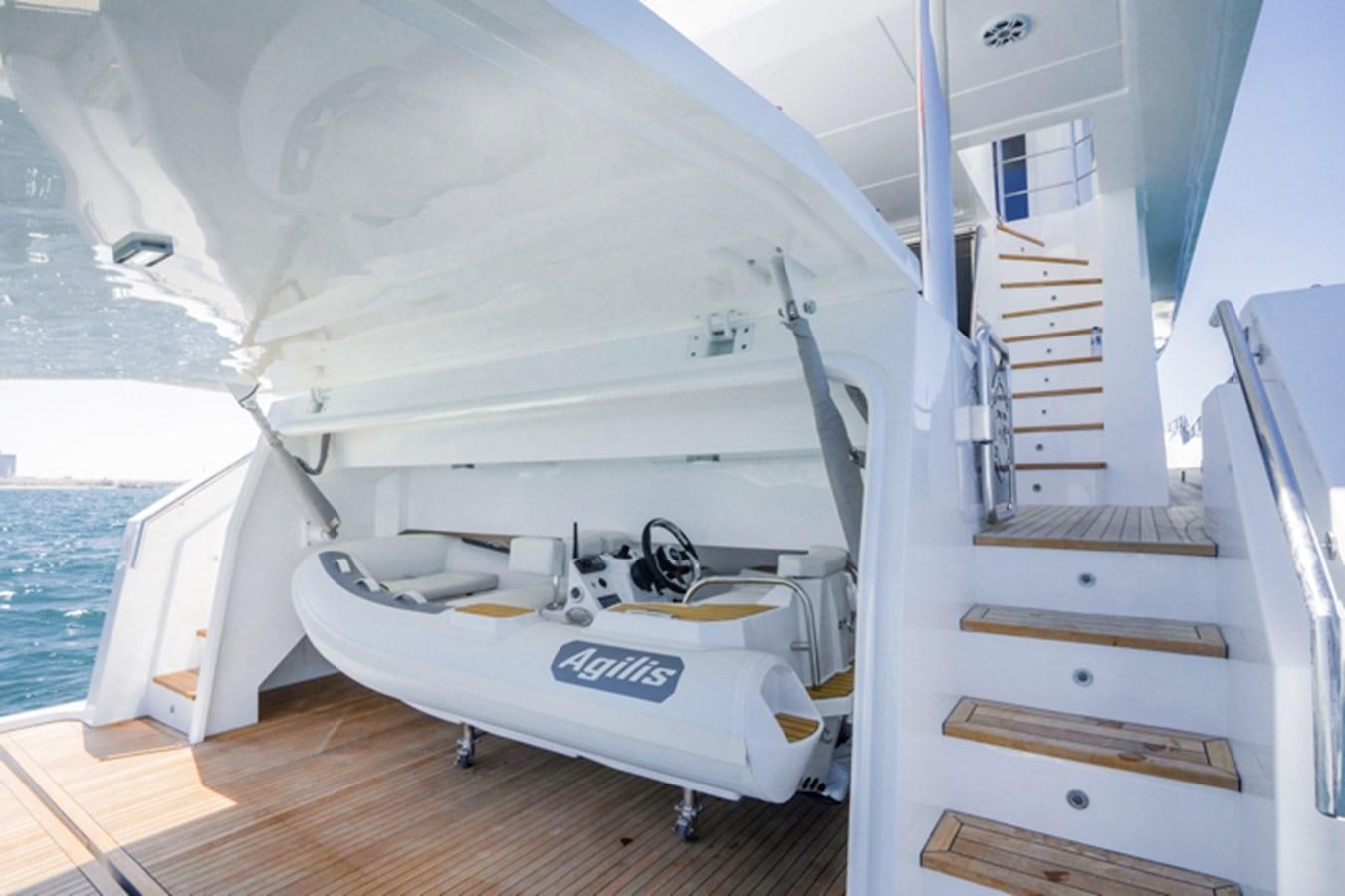 a boat on a deck aboard NOMAD 70 SUV Yacht for Sale
