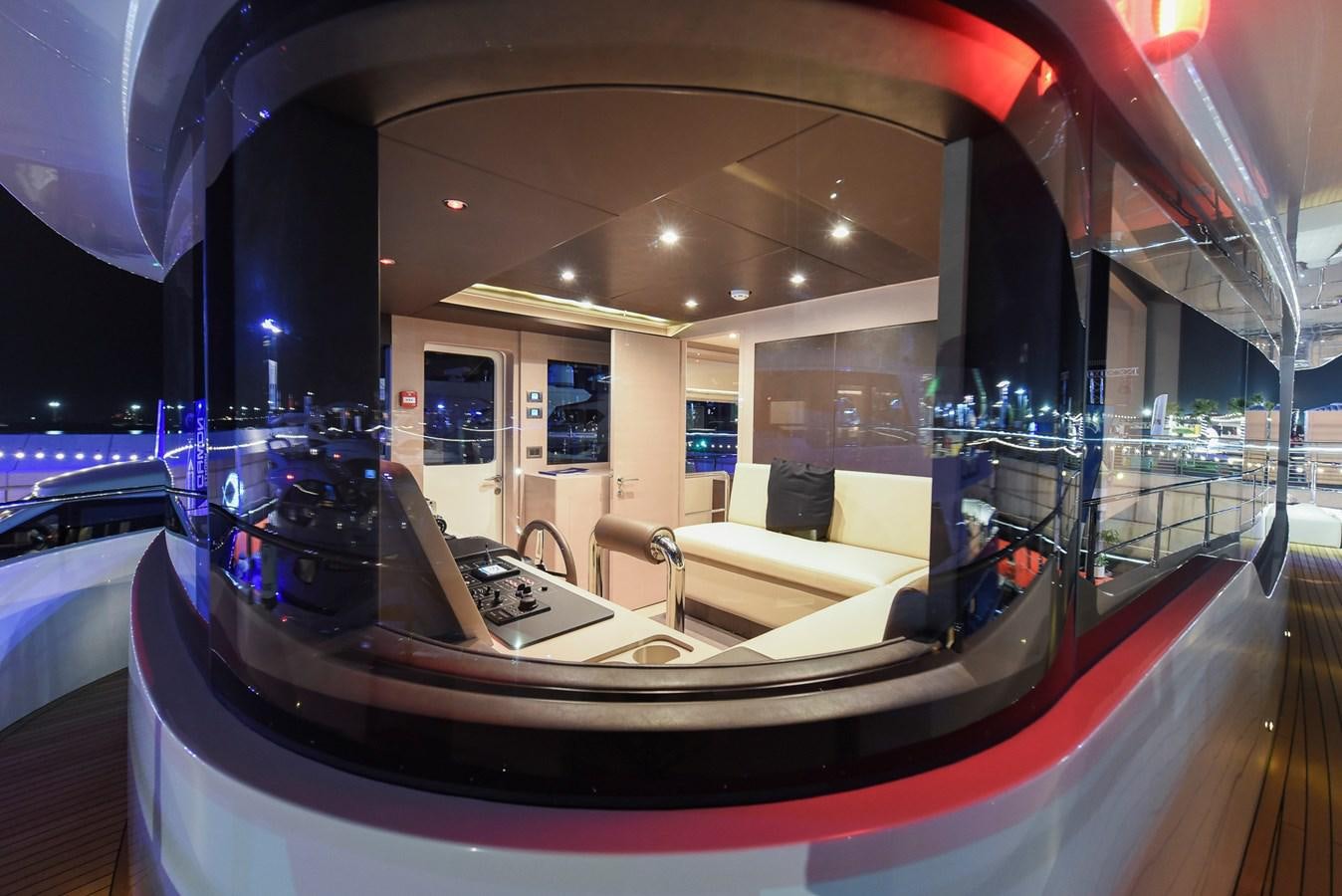 a large room with a large mirror aboard NOMAD 70 SUV Yacht for Sale