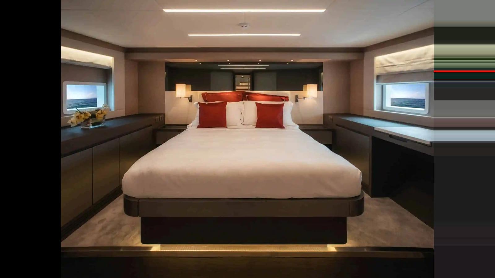 a bed in a room aboard NOMAD 70 SUV Yacht for Sale