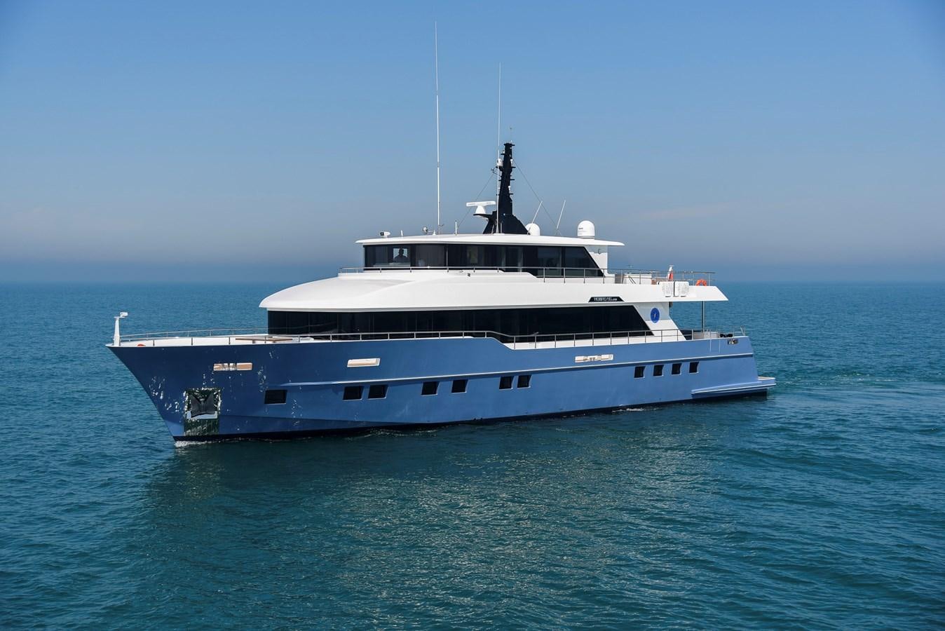 a large ship in the water aboard NOMAD 95 SUV Yacht for Sale