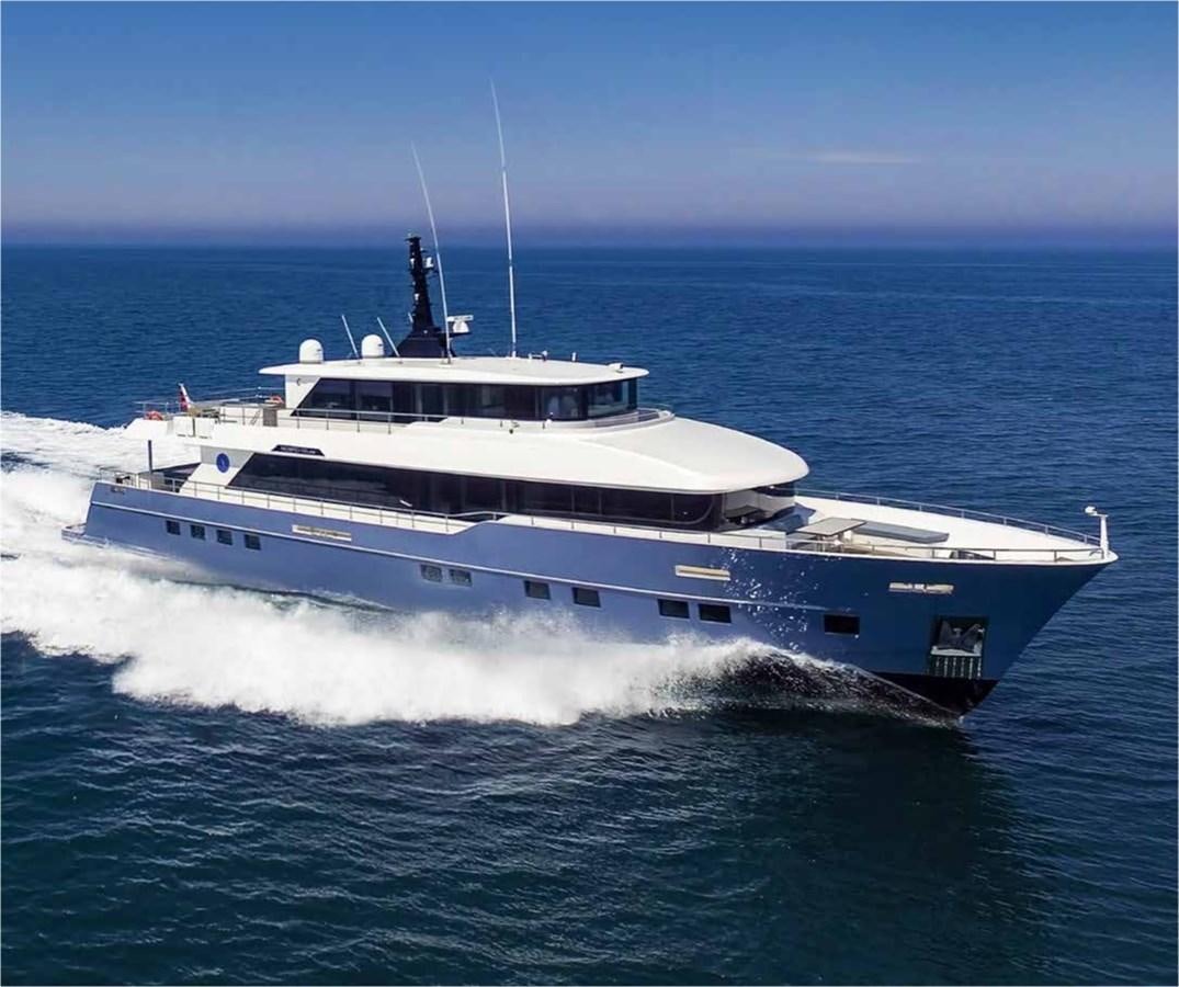 a large white ship in the water aboard NOMAD 95 SUV Yacht for Sale