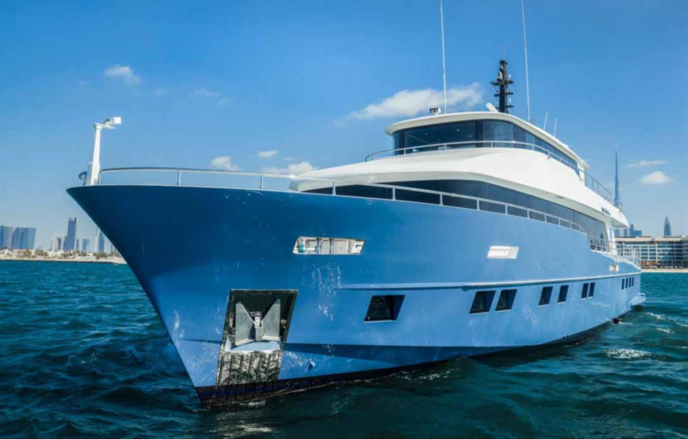a large blue and white boat aboard NOMAD 95 SUV Yacht for Sale