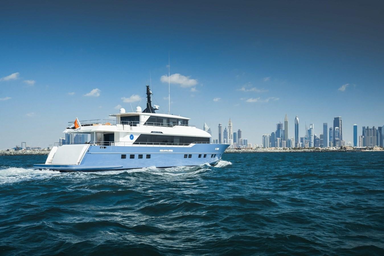 a boat on the water aboard NOMAD 95 SUV Yacht for Sale