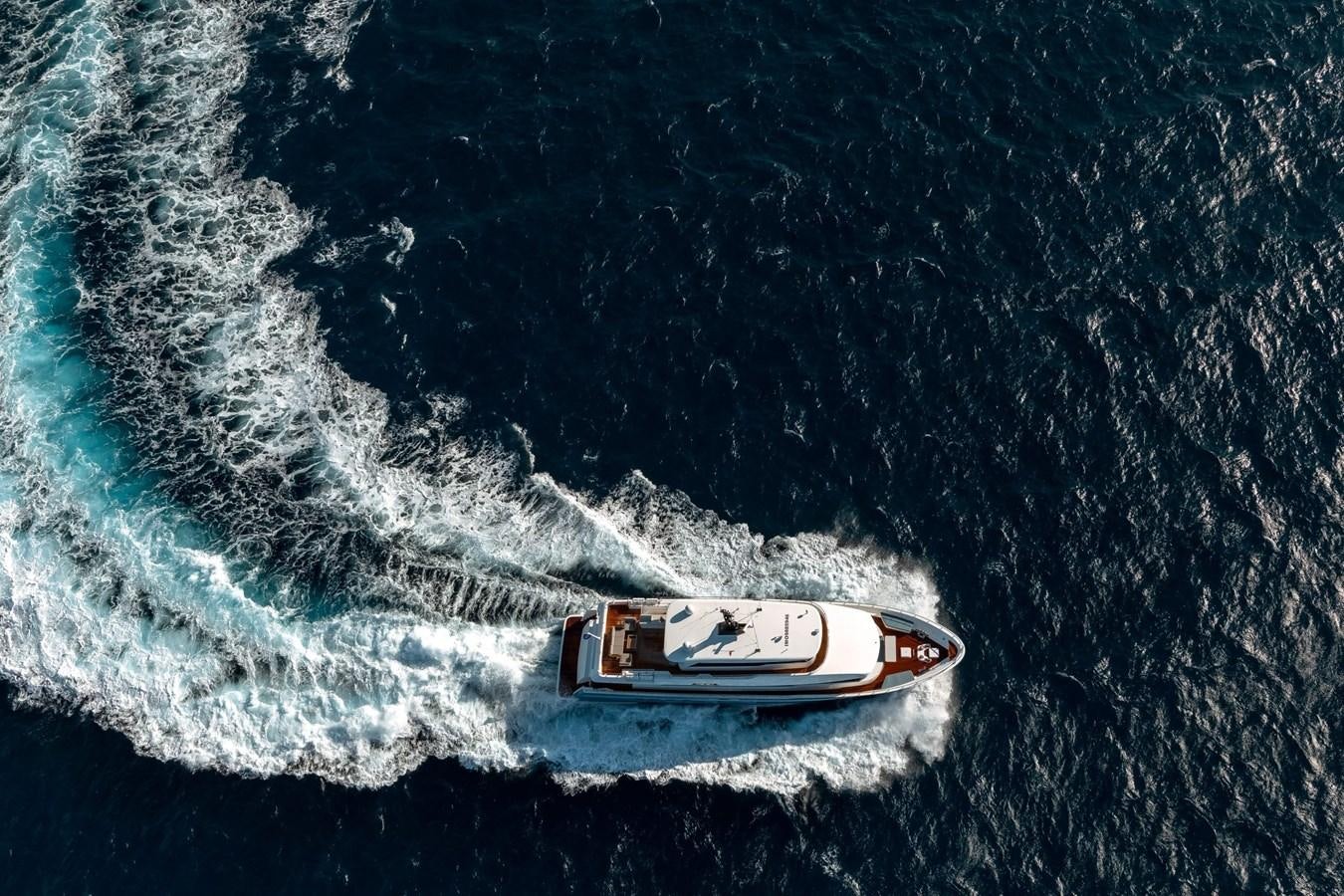 a boat in the water aboard NOMAD 95 SUV Yacht for Sale