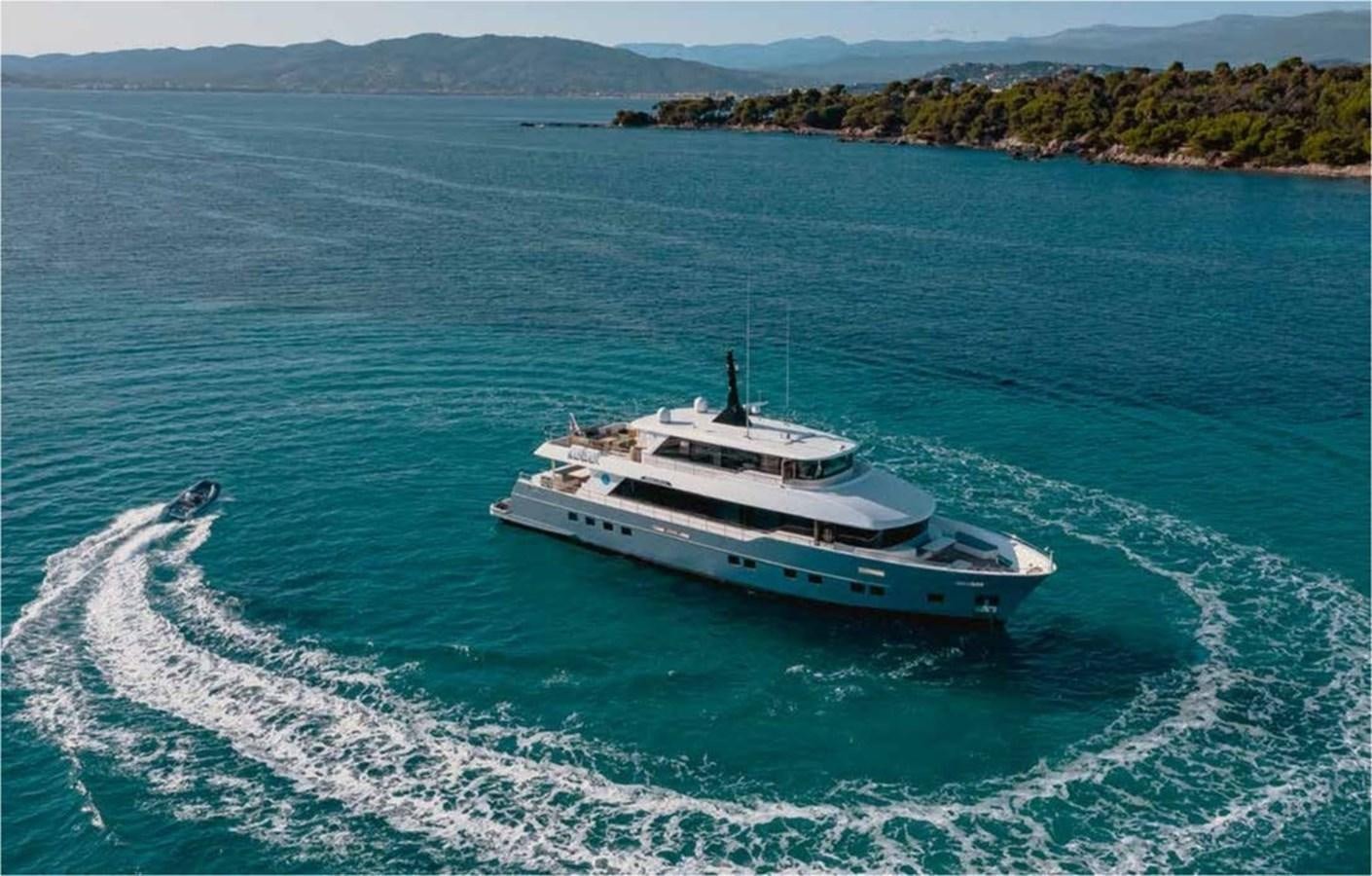 a boat on the water aboard NOMAD 95 SUV Yacht for Sale