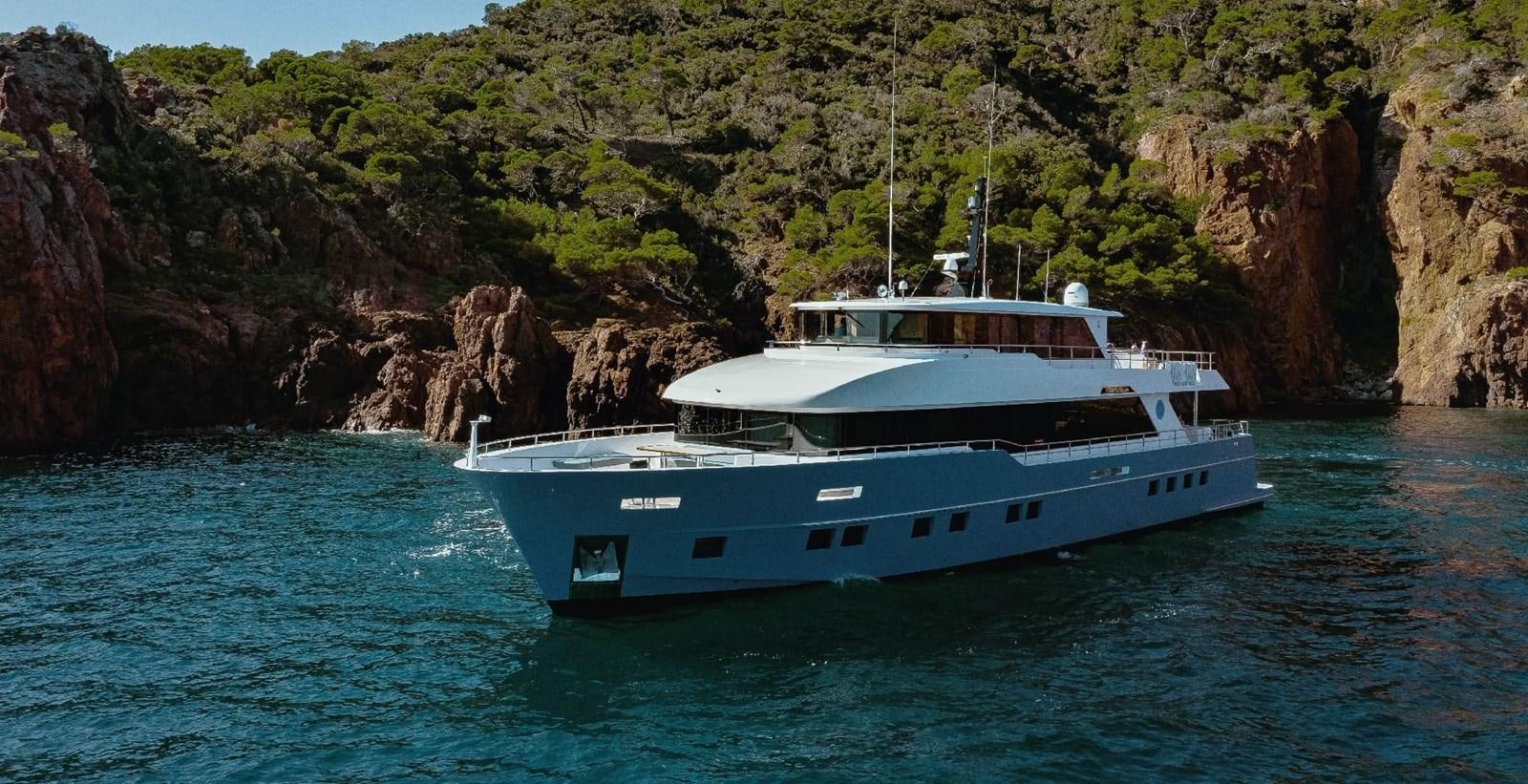 a boat on the water aboard NOMAD 95 SUV Yacht for Sale