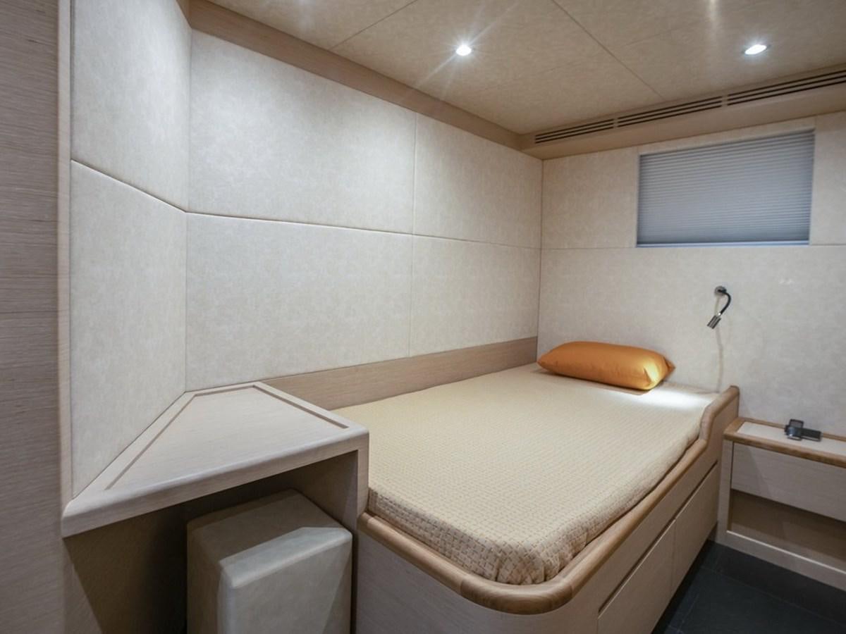 a bathroom with a toilet and a sink aboard NOMAD 95 SUV Yacht for Sale