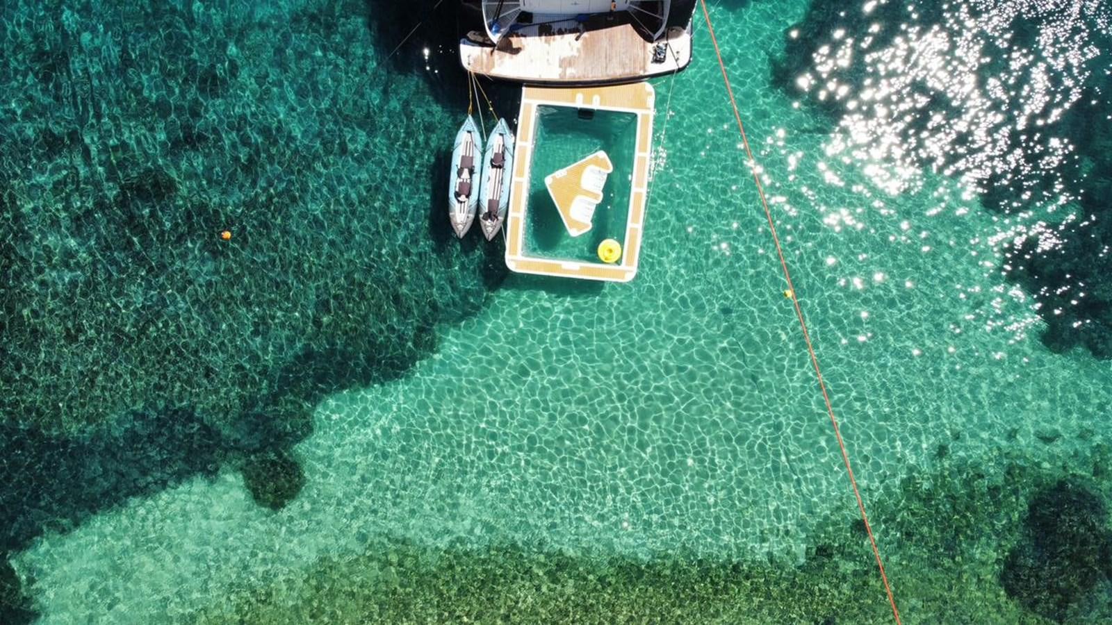 a lawnmower on a lawn aboard 3D Yacht for Sale