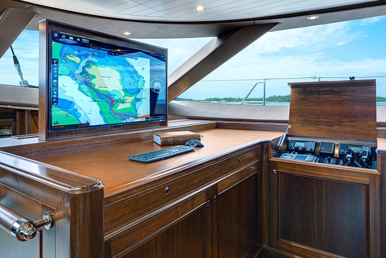 a tv on a counter aboard ENCORE Yacht for Sale