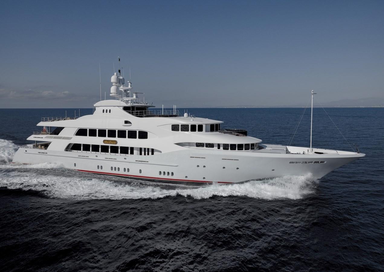 a large white boat on the water aboard IRON BLONDE Yacht for Sale