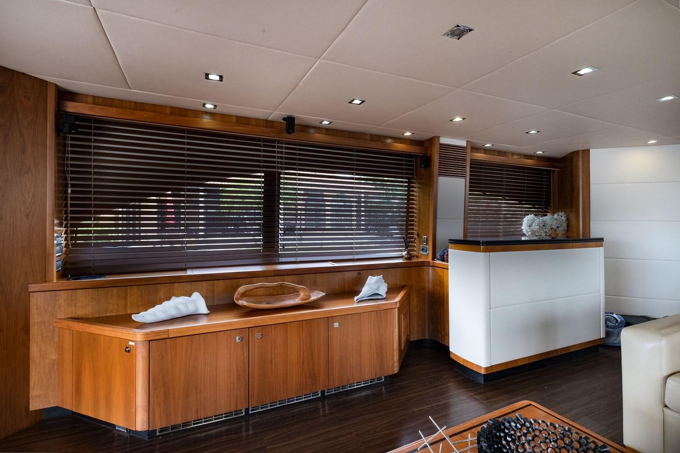 a room with a large window aboard EL TIO Yacht for Sale