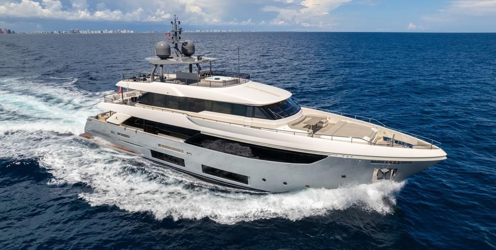 a white yacht on the water aboard COFINA Yacht for Sale