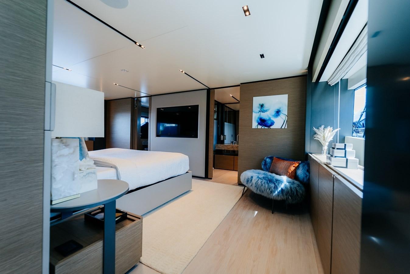 a living room with a large window aboard COFINA Yacht for Sale
