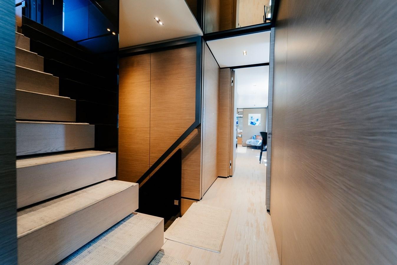 a room with a large wooden closet aboard COFINA Yacht for Sale