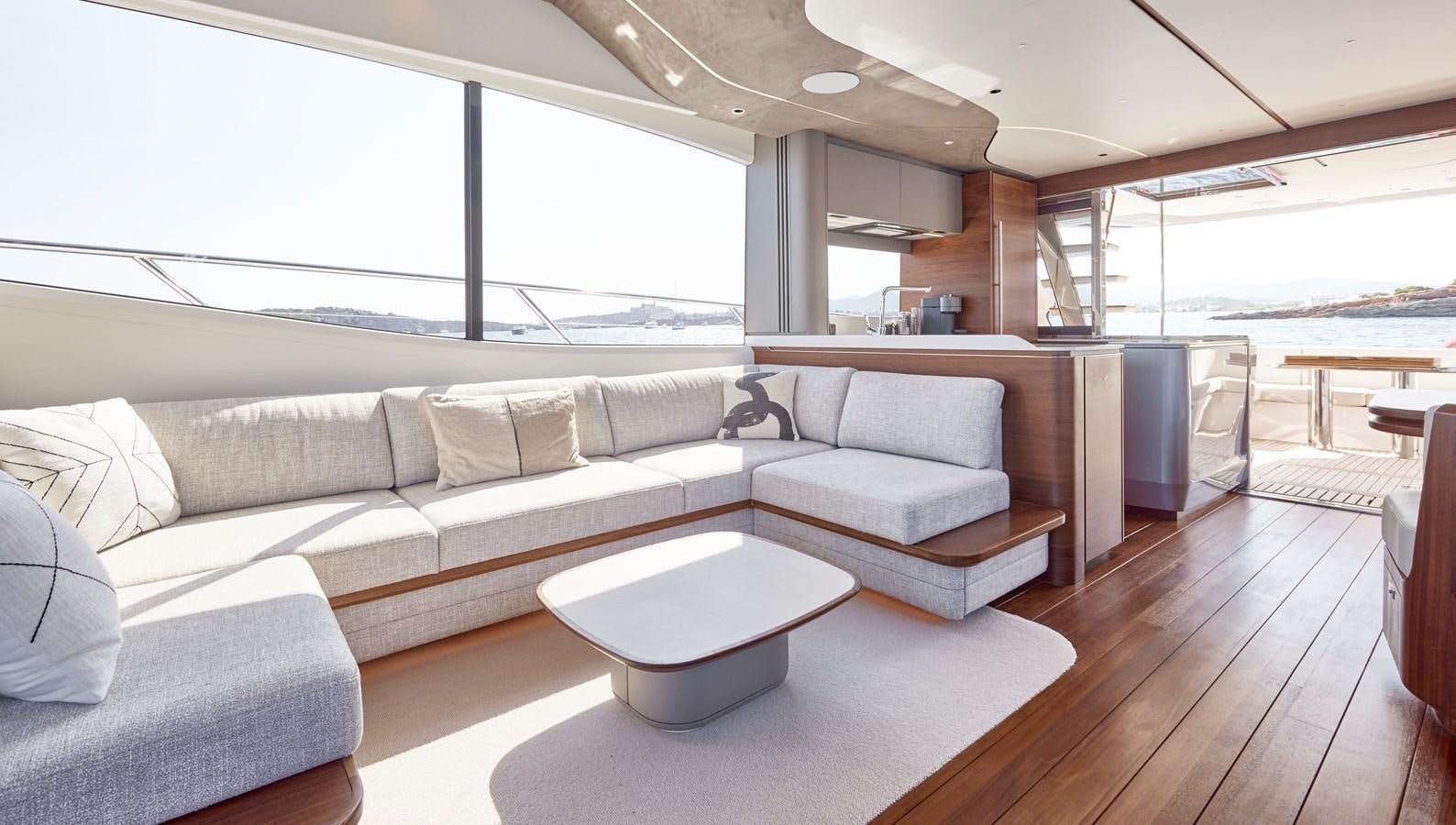a living room with a large window aboard VENTURE Yacht for Sale