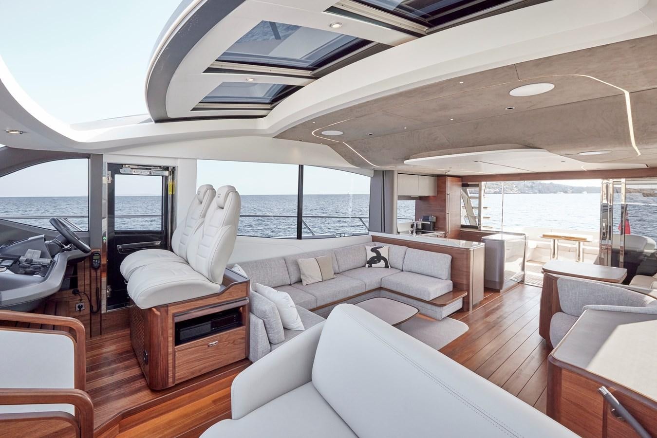 a room with a view of the ocean and the deck aboard VENTURE Yacht for Sale