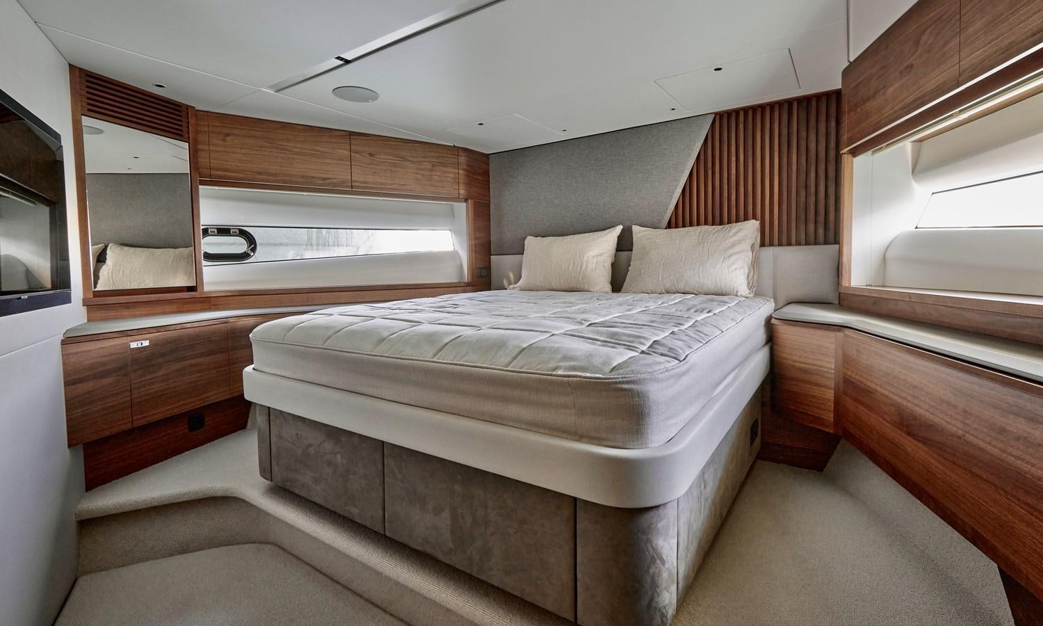 a bed in a room aboard VENTURE Yacht for Sale