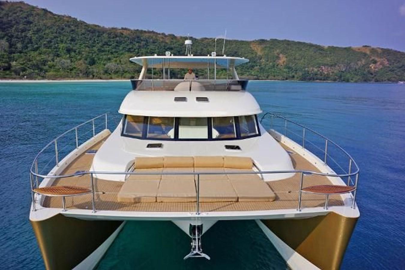a boat on the water aboard 2021 HELIOTROPE NL 70 SOLAR ELECTRIC Yacht for Sale