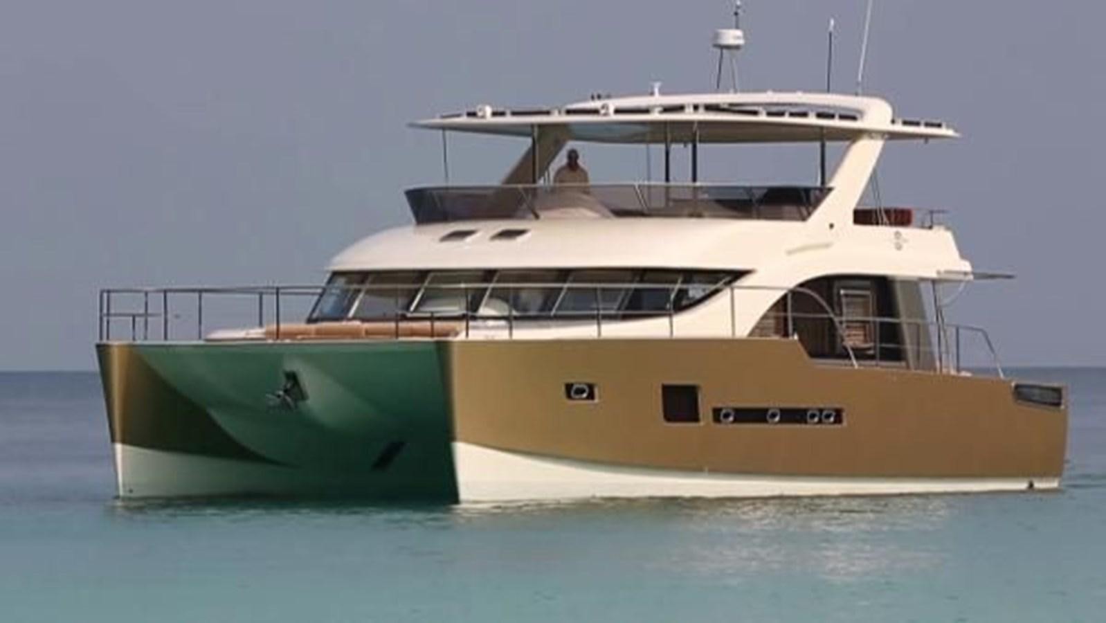 a boat in the water aboard 2021 HELIOTROPE NL 70 SOLAR ELECTRIC Yacht for Sale