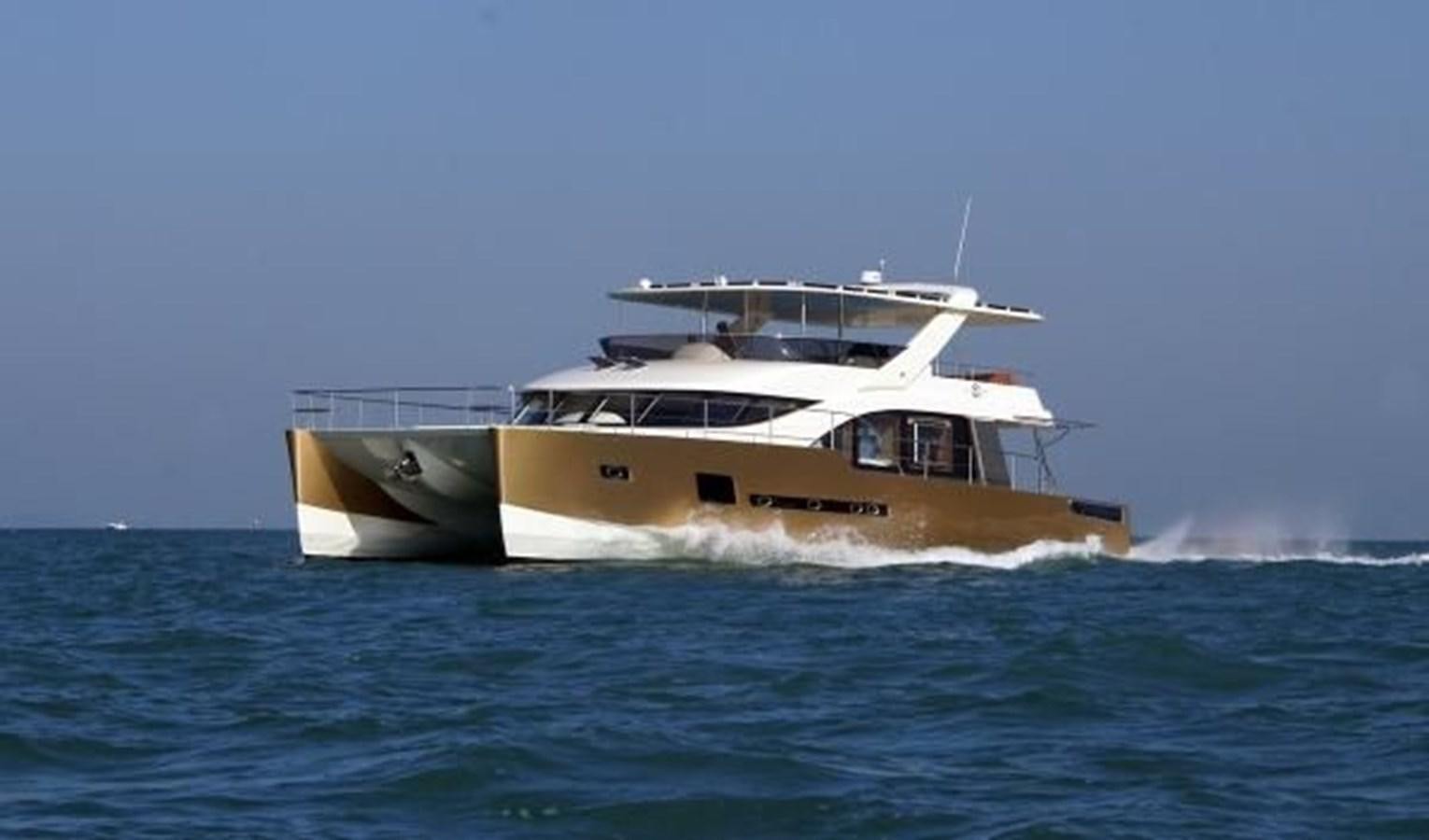 a boat in the water aboard 2021 HELIOTROPE NL 70 SOLAR ELECTRIC Yacht for Sale