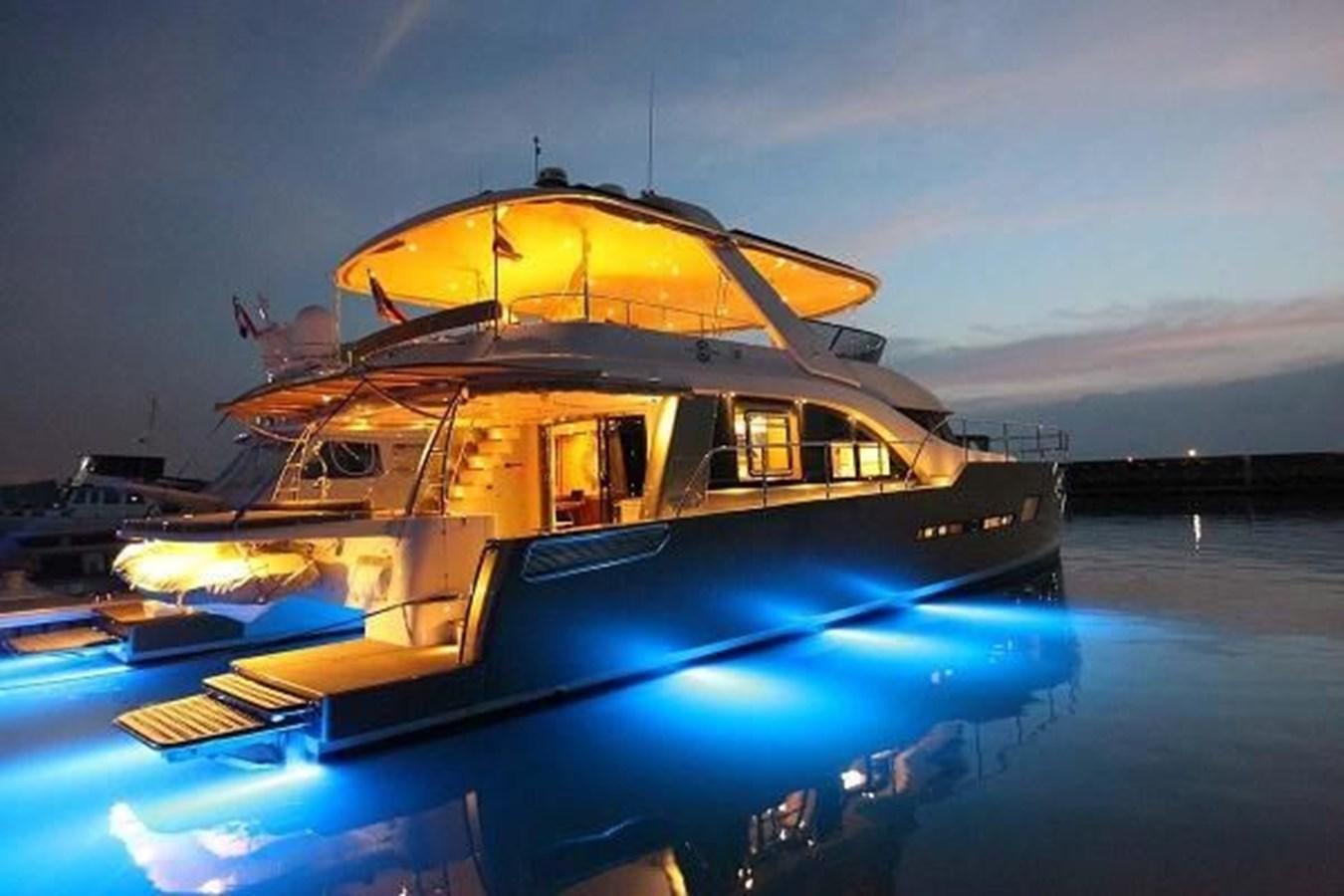 a boat on the water aboard 2021 HELIOTROPE NL 70 SOLAR ELECTRIC Yacht for Sale