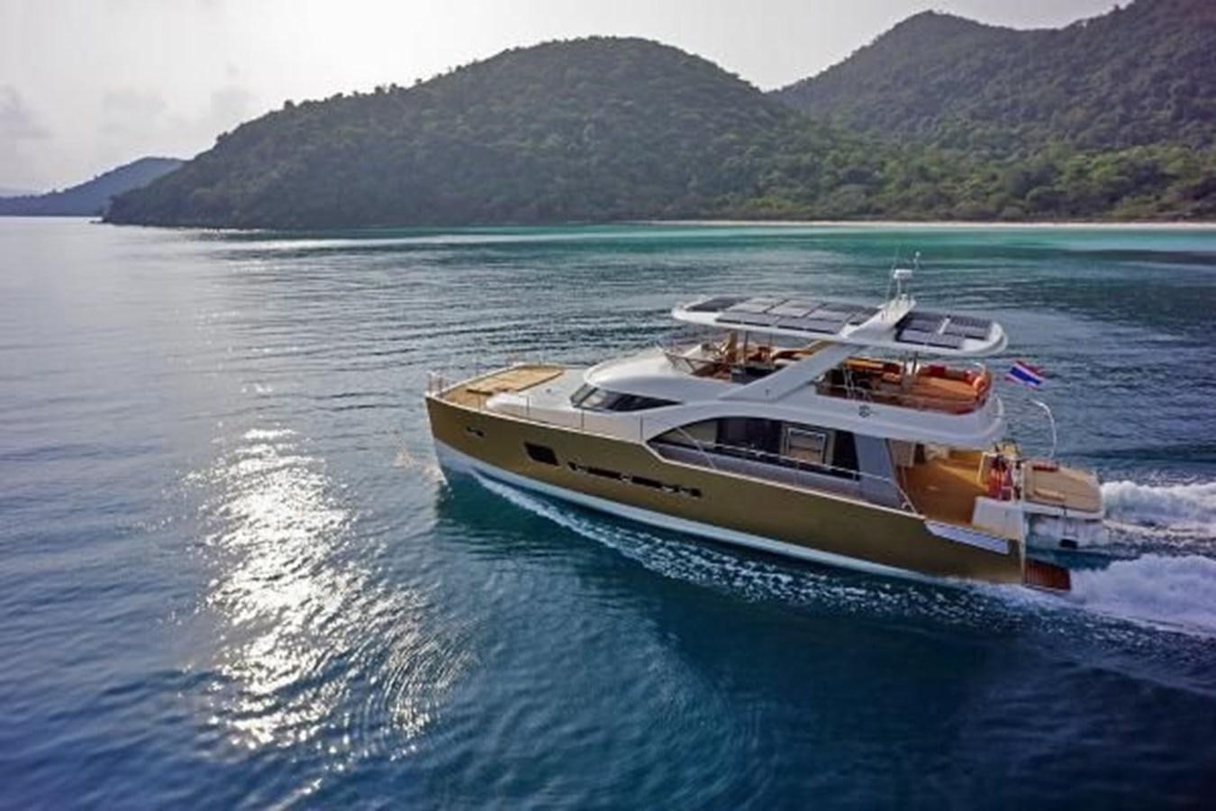 a boat on the water aboard 2021 HELIOTROPE NL 70 SOLAR ELECTRIC Yacht for Sale