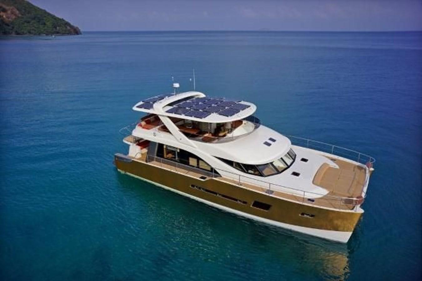 a boat in the water aboard 2021 HELIOTROPE NL 70 SOLAR ELECTRIC Yacht for Sale