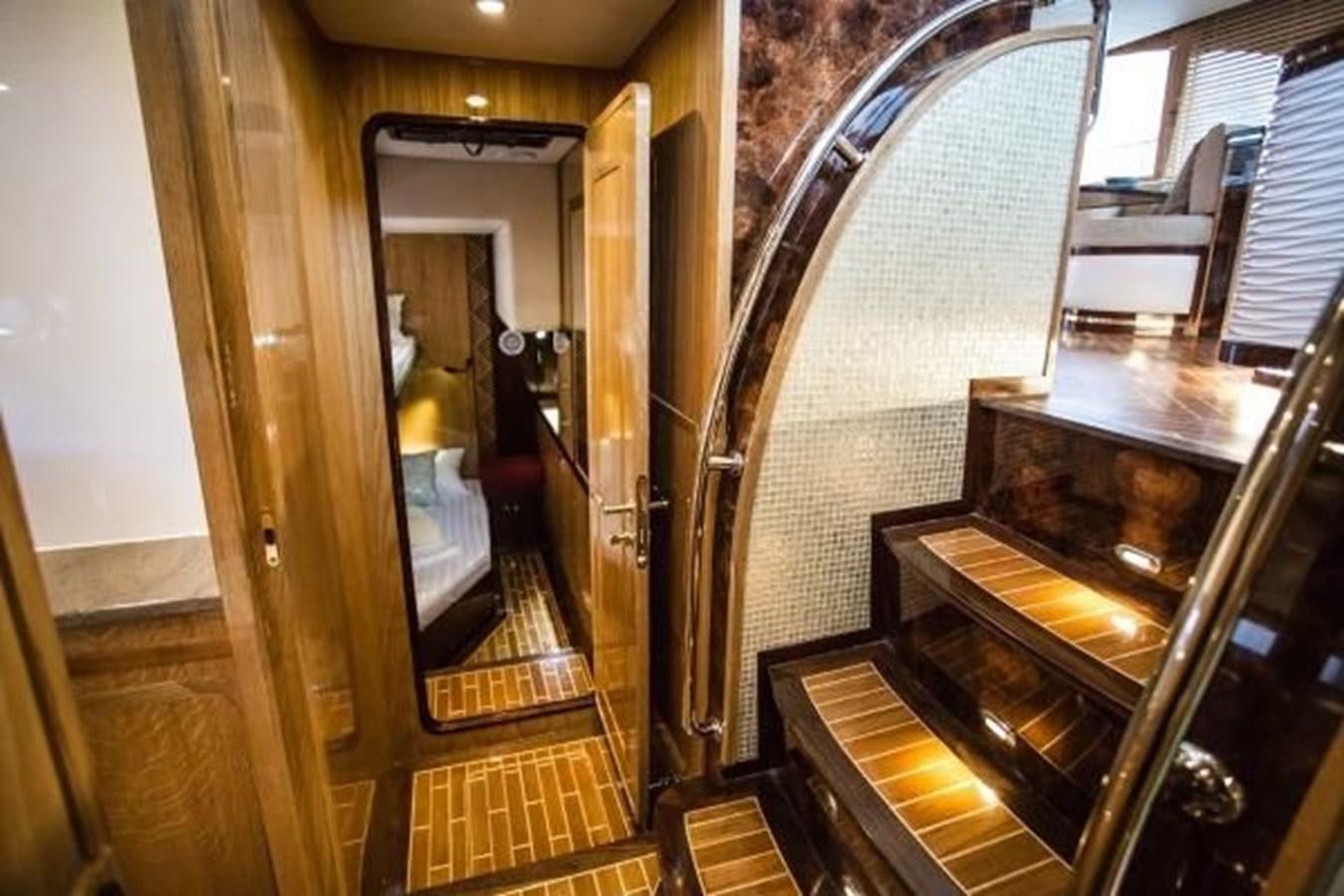 a hallway with a glass door aboard 2021 HELIOTROPE NL 70 SOLAR ELECTRIC Yacht for Sale