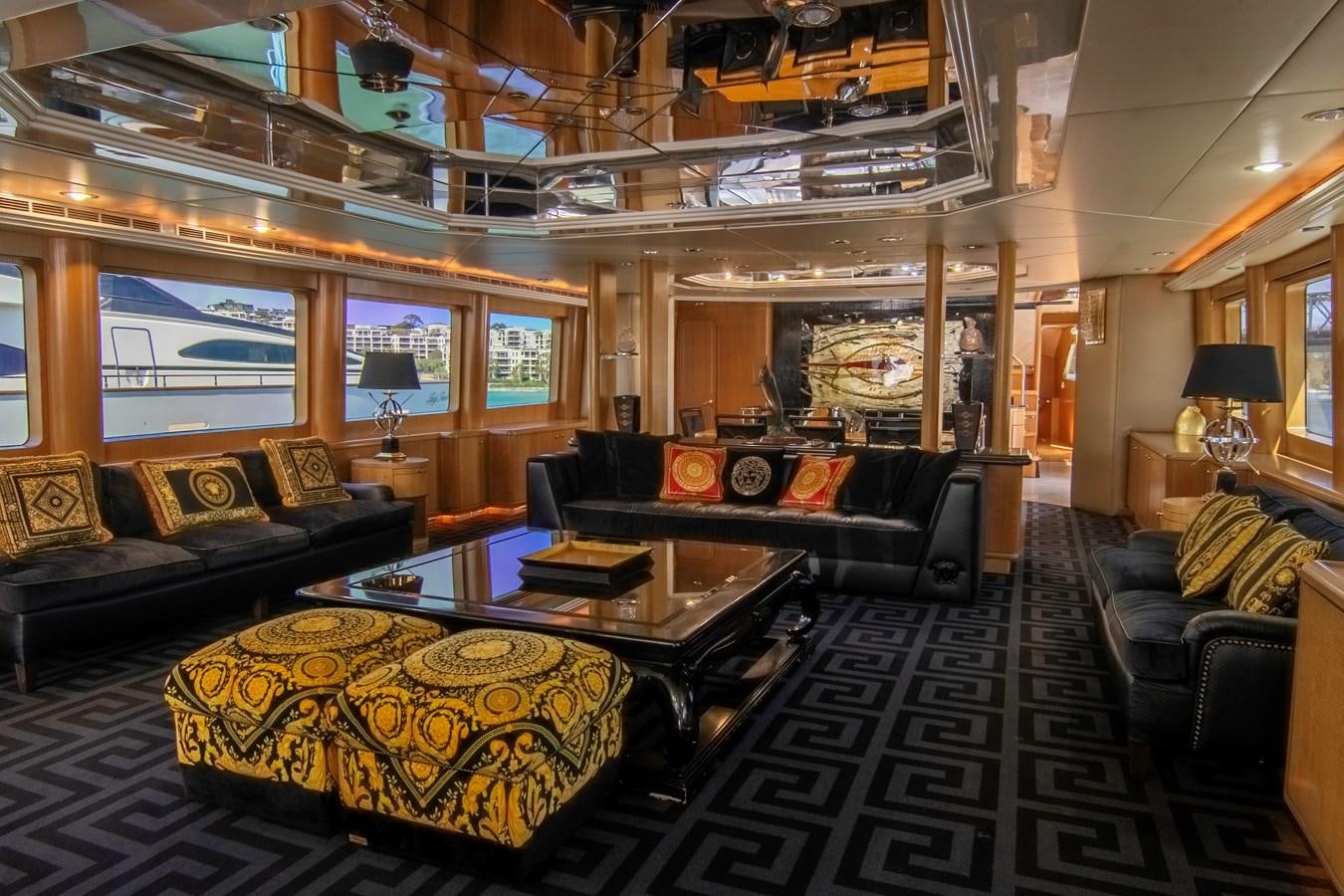 a living room with a large fireplace aboard LADY AUDREY Yacht for Sale