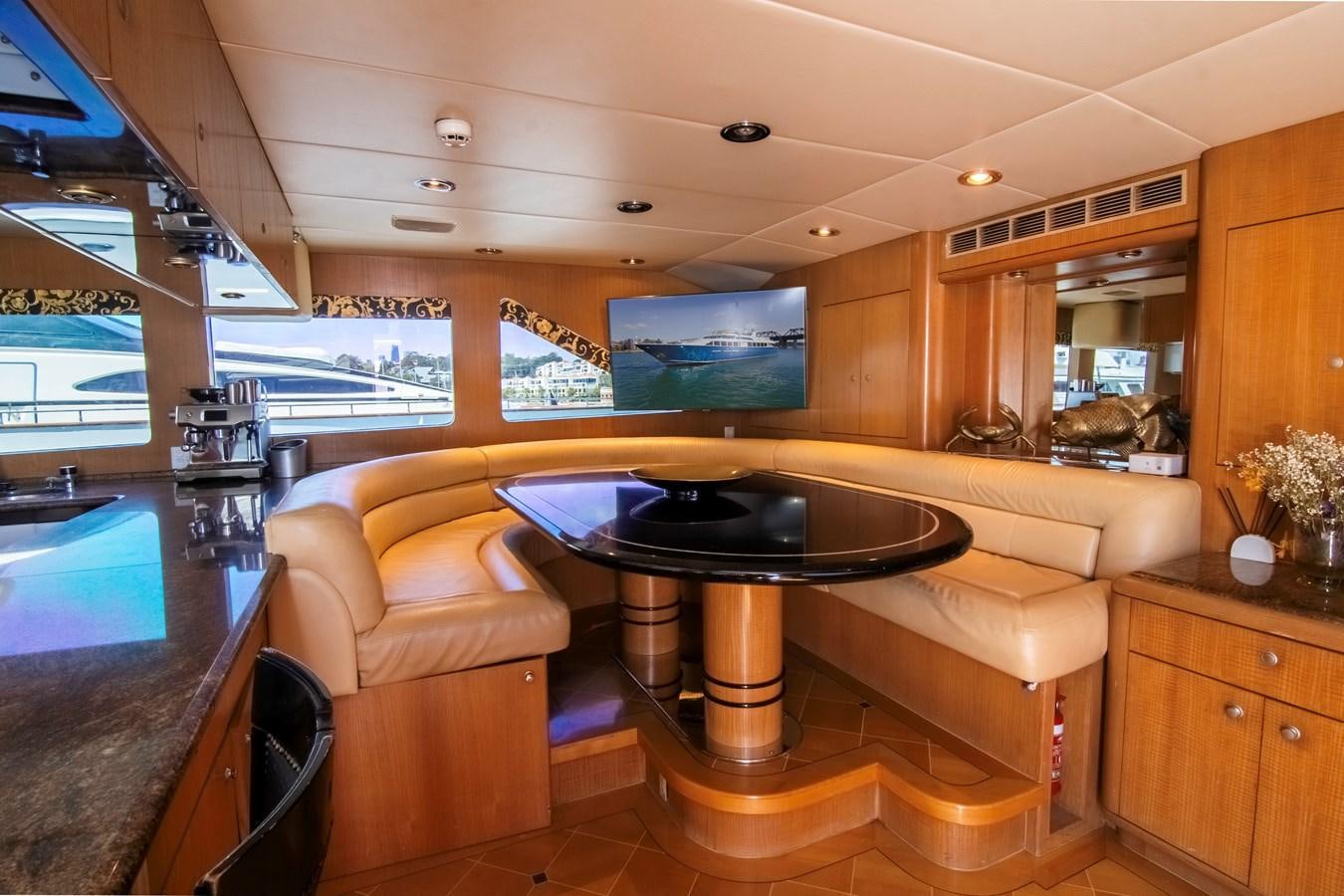 a living room with a large table aboard LADY AUDREY Yacht for Sale