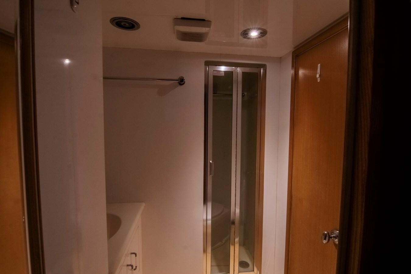 a bathroom with a shower and sink aboard LADY AUDREY Yacht for Sale
