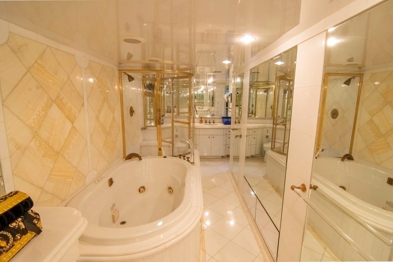 a bathroom with a tub and shower aboard LADY AUDREY Yacht for Sale
