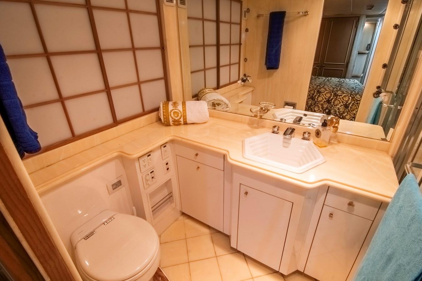 a bathroom with a sink and a toilet aboard LADY AUDREY Yacht for Sale