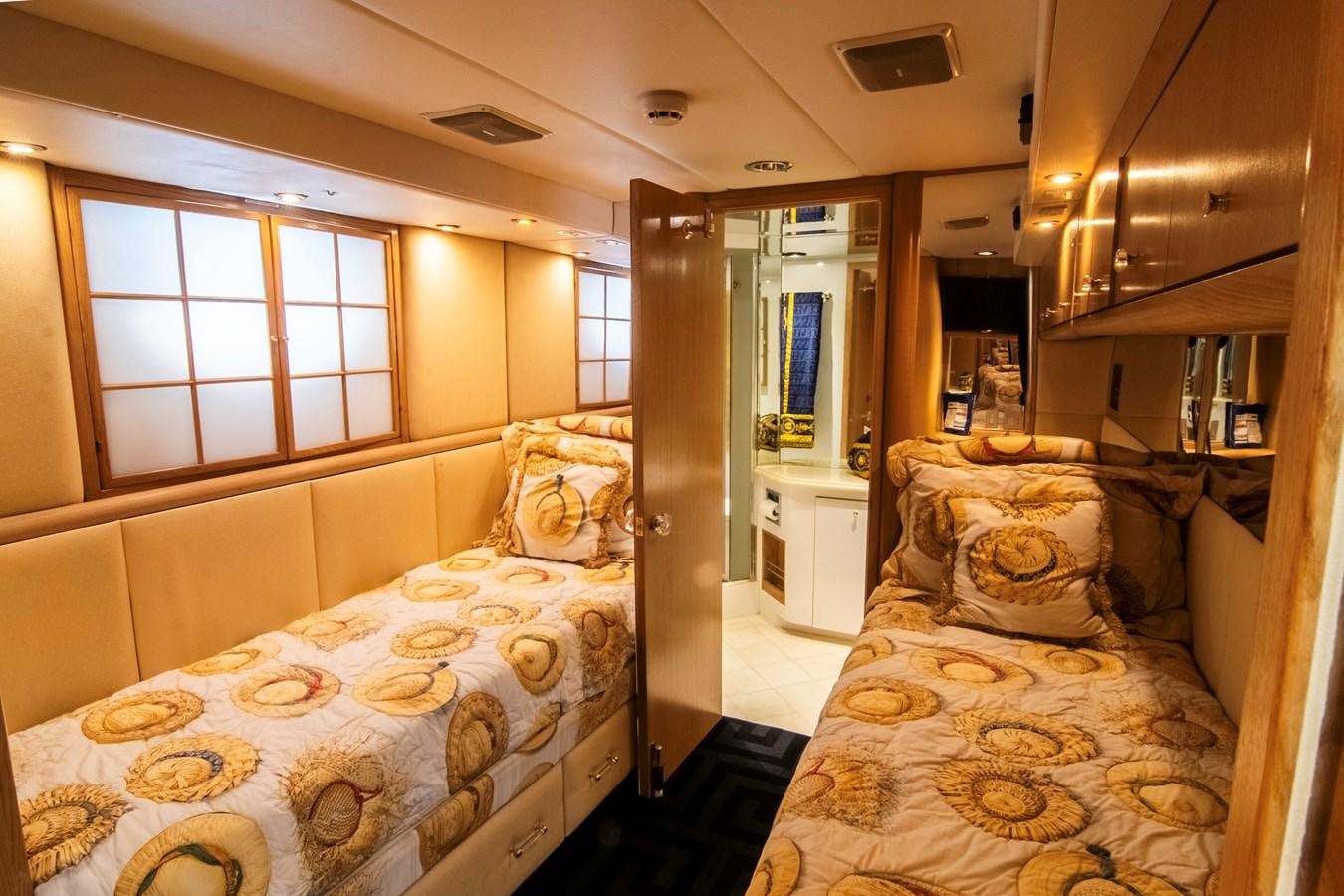 a bedroom with two beds aboard LADY AUDREY Yacht for Sale