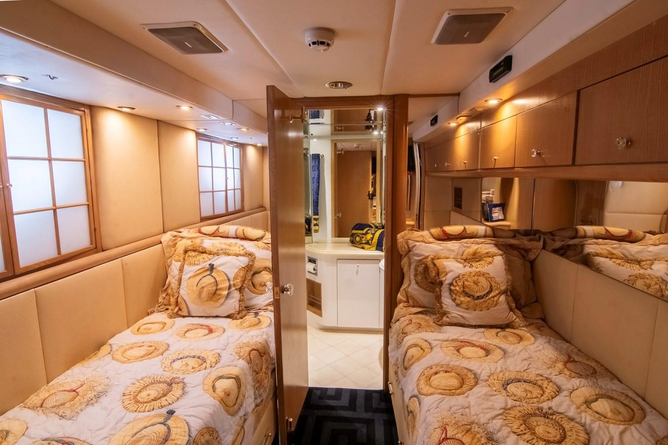 a bedroom with two beds aboard LADY AUDREY Yacht for Sale