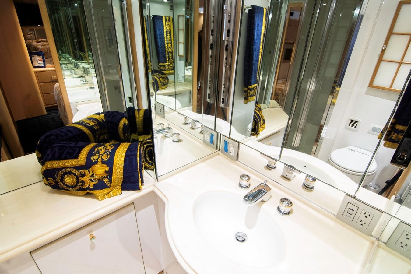 a bathroom with a large mirror aboard LADY AUDREY Yacht for Sale